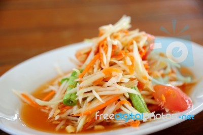 Spicy Papaya Salad - Thai Style Stock Photo