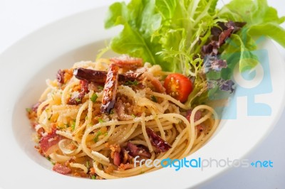 Spicy Pasta With Dried Chili And Bacon Stock Photo