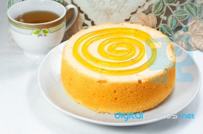 Sponge Cake With Tea Cup Stock Photo
