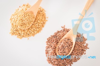 Spoon Of Flax Seed On Clean Kitchen Table Stock Photo