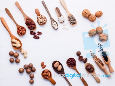 Spoon Of Various Legumes And Different Kinds Of Nuts Walnuts Ker… Stock Photo