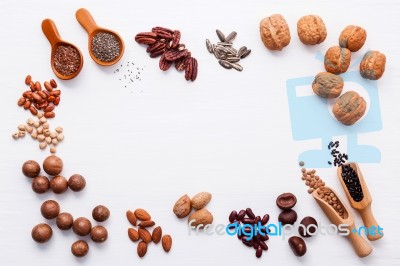 Spoon Of Various Legumes And Different Kinds Of Nuts Walnuts Ker… Stock Photo
