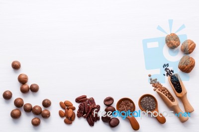Spoon Of Various Legumes And Different Kinds Of Nuts Walnuts Ker… Stock Photo