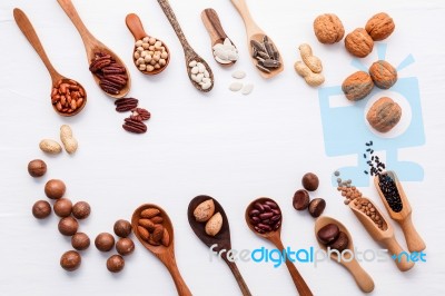 Spoon Of Various Legumes And Different Kinds Of Nuts Walnuts Ker… Stock Photo