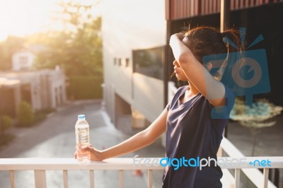 Sports Women Relax Time And Drinking Water Stock Photo
