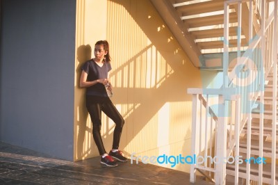 Sports Women Relax Time And Drinking Water Stock Photo