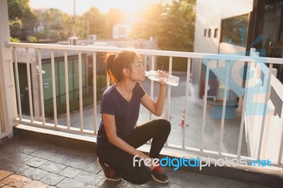 Sports Women Relax Time And Drinking Water Stock Photo