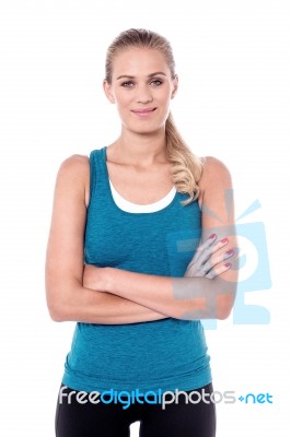 Sporty Woman With Folded Arms Stock Photo