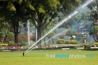 Sprinkler Was In The Lawn Water Injection Stock Photo