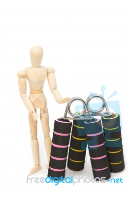 Squeezing Hand Coil Exercise Equipment With Wooden Modle Dummy Stock Photo