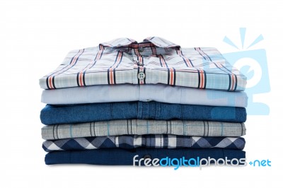 Stack Of Clothes Isolated On White Stock Photo