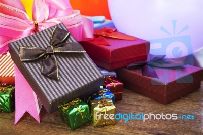 Stack Of Gift Box Lying On Top Wood Table Stock Photo