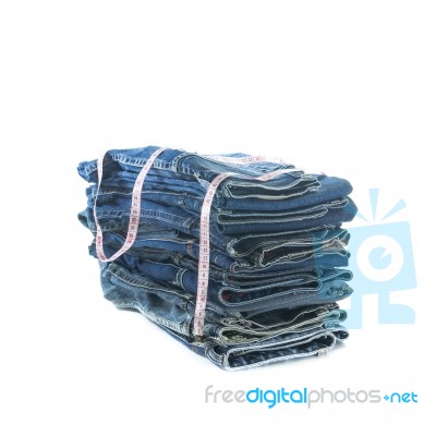 Stack Of Jeans Trousers Stock Photo