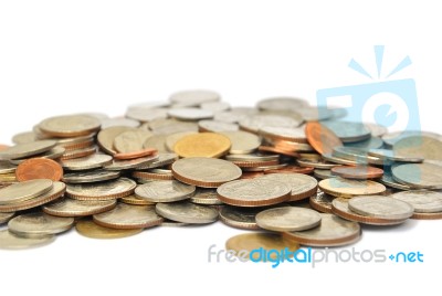 Stacked Coin On An Isolated White Background Stock Photo