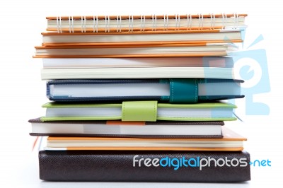 Stacked notebooks Stock Photo