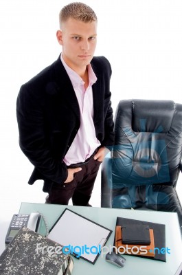 Standing Businessman At Office Stock Photo