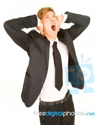 Standing Businessman Screaming Stock Photo