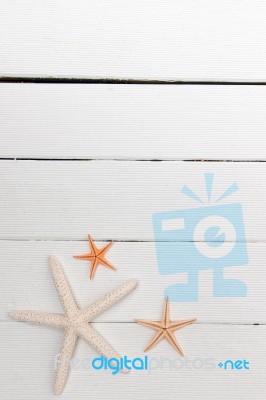 Starfish On White Wood Stock Photo