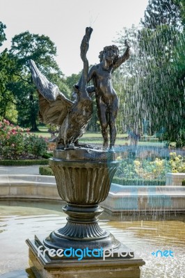 Statue Of A Boy And Swan At Wilanow Palace In Warsaw Stock Photo