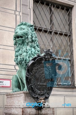 Statue Of  A Green Lion At Odeonsplatz In Munich Stock Photo