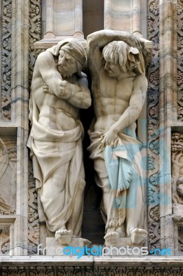 Statues In  Front Of The Dome Of Milan Stock Photo