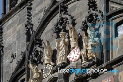 Statues On The Entrance Tower To Charles Bridge In Prague Stock Photo