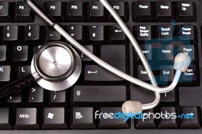 Stethoscope On A Computer Keyboard Stock Photo