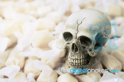 Still Life Of Human Skull With Candy Stock Photo