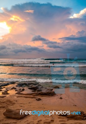 Storm Clouds Over A Beach With Waves Stock Photo