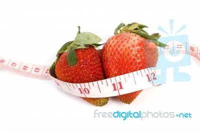 Strawberries And Tape Measure Stock Photo