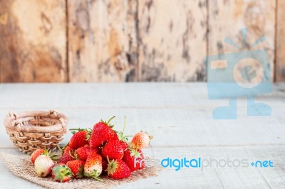 Strawberries On The Wooden Stock Photo