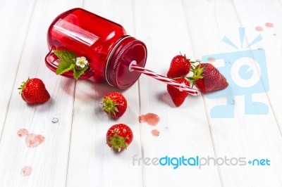 Strawberry Smoothie In Mason Jar With Straw Stock Photo
