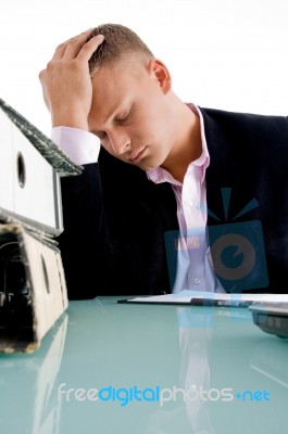 stressed Businessman at his desk Stock Photo