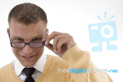 Student Adjusting His Spectacles Stock Photo