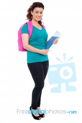 Student With Backpack And Notebook Stock Photo