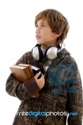 Student With Books And Headset Stock Photo