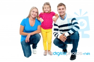 Studio Portrait Of Charming Young Family Stock Photo Studio Portrait Of Charming Young Family Stock Photo