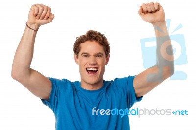 Successful Excited Isolated Young Guy Stock Photo