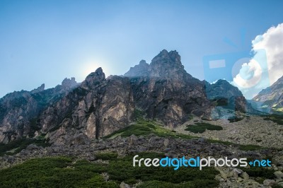 Sun Rays  In High Mountains Panorama Of High Tatra Mountains In Stock Photo