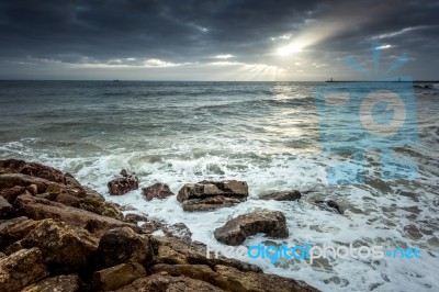 Sun Setting At Quarteira In Portugal Stock Photo Sun Setting At Quarteira In Portugal Stock Photo