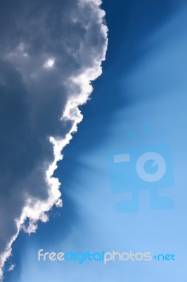 Sunlight Behind Cloud Stock Photo