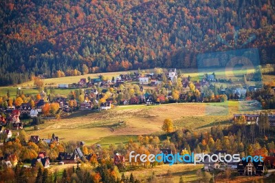 Sunny October Day In Mountain Village. Autumn In Poland Stock Photo