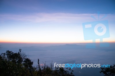 Sunrise And Sea Of Mist Stock Photo