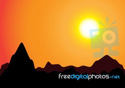 Sunset And Mountains In Silhouette Stock Image