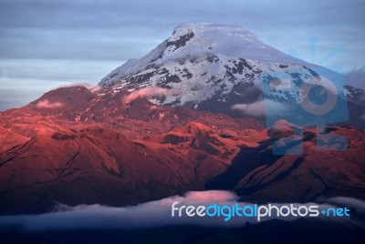 Sunset On The Mighty Volcano Cayambe In Ecuador Stock Photo