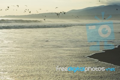 Sunset On The Pacific Coast Of Peru Stock Photo