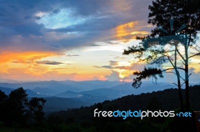 Sunset Over High Mountain Range Stock Photo