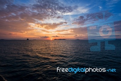 Sunset Over The Sea In Thailand Stock Photo