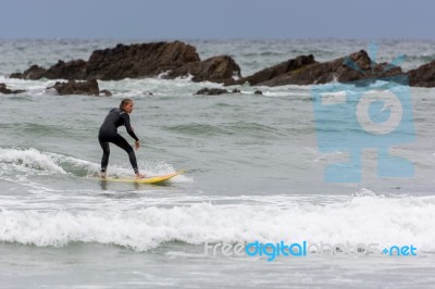 Surfing In Cornwall Stock Photo