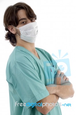 Surgeon In Scrubs With Facemask Stock Photo